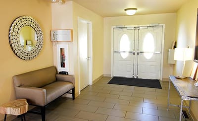 Bright entrance lobby with seating area