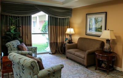 Cozy common area with comfortable seating and natural light