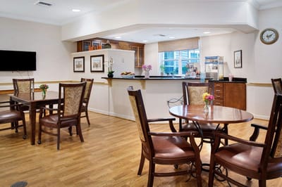 Bright dining room with wooden tables and chairs