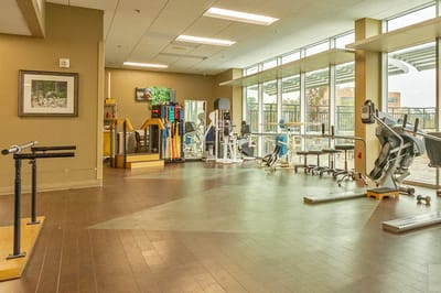 Interior view of a modern rehabilitation gym with exercise equipment