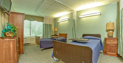 Private room with two beds and natural light