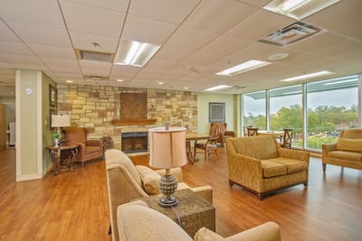 Common area with comfortable seating and large windows