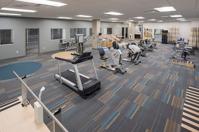 Interior view of a fitness area with exercise equipment