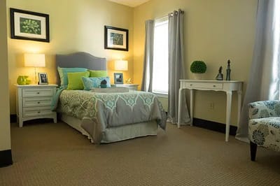 Cozy resident room with bed and decor