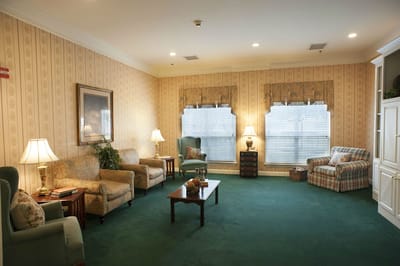 Cozy common area with seating and lamps