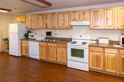 Interior view of a kitchen with wooden cabinets