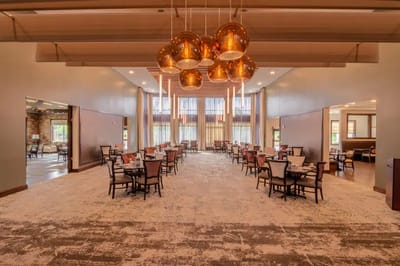 Bright dining area with modern decor and tables