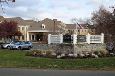 Exterior view of Coachman Square at Woodbridge facility