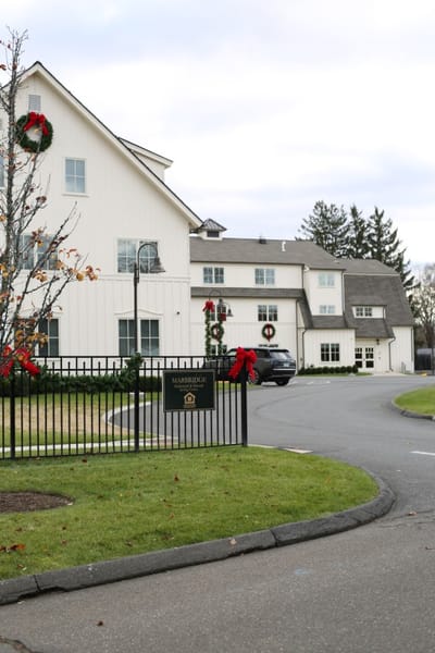 Exterior view of Marbridge Retirement Center with holiday decorations