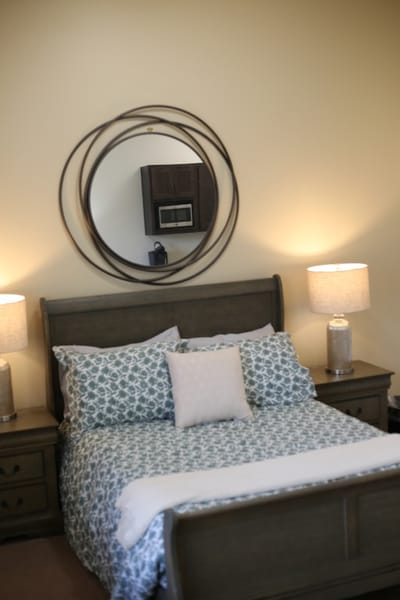 Cozy bedroom setup with warm lighting and decor