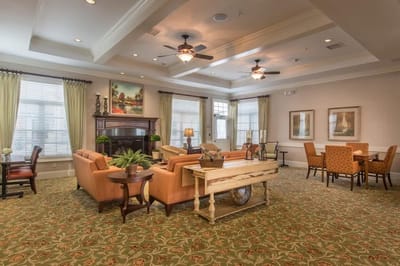 Cozy common area with comfortable seating and tables