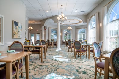Bright dining room with tables and chairs