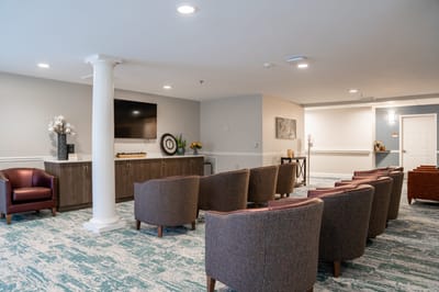 Common area with seating and television