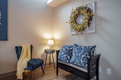Cozy corner in a resident's room with decor