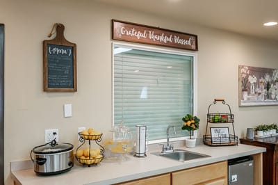 Interior view of a kitchen space with decor and food