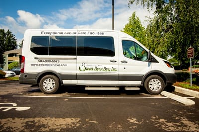 Facility transport van parked in a lot
