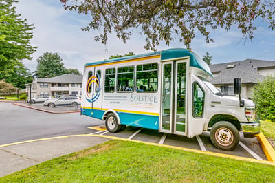 Facility transport vehicle parked outside the building