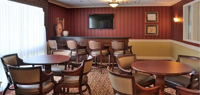 Interior common area with seating and a television