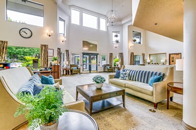 Bright and inviting common area with seating and natural light