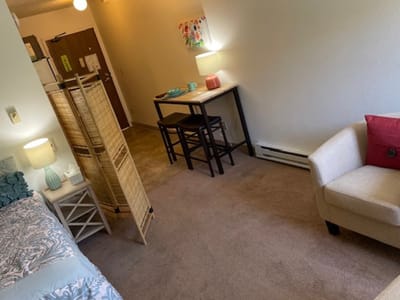Cozy resident room with furniture and decor