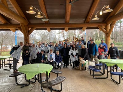 Group of residents and staff at an outdoor event