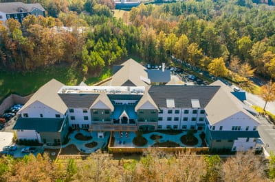 Aerial view of Longleaf Liberty Park surrounded by trees