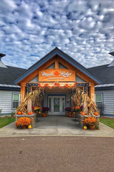 Entrance to Maple Ridge Lodge decorated for fall