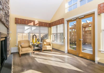 Bright common area with chairs and outdoor view