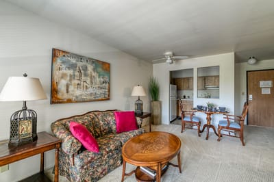 A cozy resident living room with a kitchenette