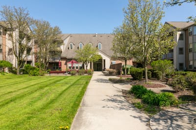Outdoor space with garden and pathway at Rosehaven Manor