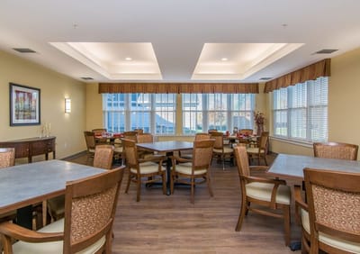 Bright dining room with wood tables and chairs