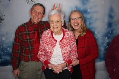 Residents and staff enjoying a festive photo together