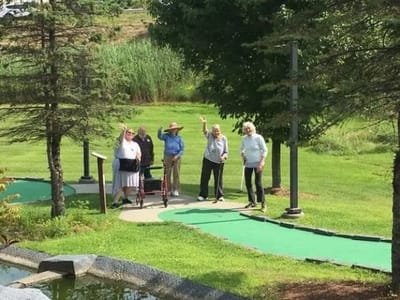 Residents enjoying outdoor activities on a sunny day