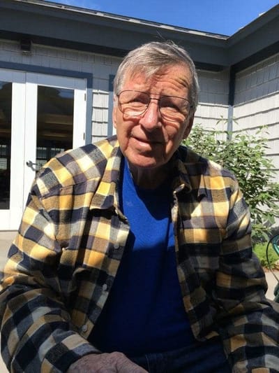 Senior man outdoors enjoying the sunshine