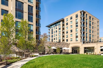 Exterior view of building with landscaped outdoor space