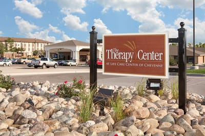 Building exterior with signage for The Therapy Center