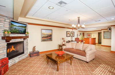 Cozy common area with a fireplace and seating