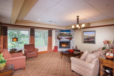 Cozy common area with seating and fireplace