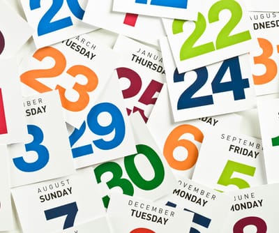 A collection of colorful calendar cards with dates