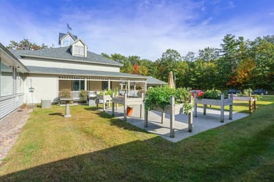 Outdoor patio area with planters and seating