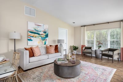 Bright interior lounge with comfortable seating and artwork