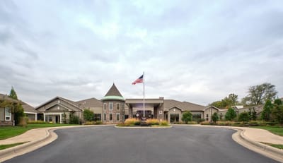 Exterior view of Gables of Westerville with flag and landscaping