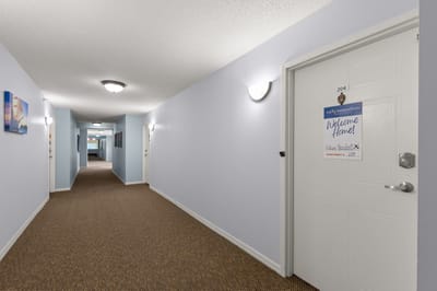Residential hallway with decorated door