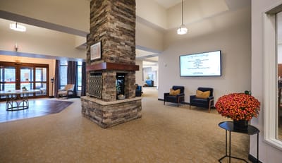 Interior view of a cozy common area with seating and decor
