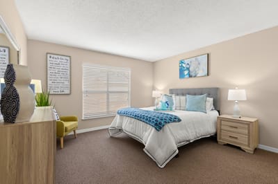 Bright and welcoming private bedroom in a senior living facility