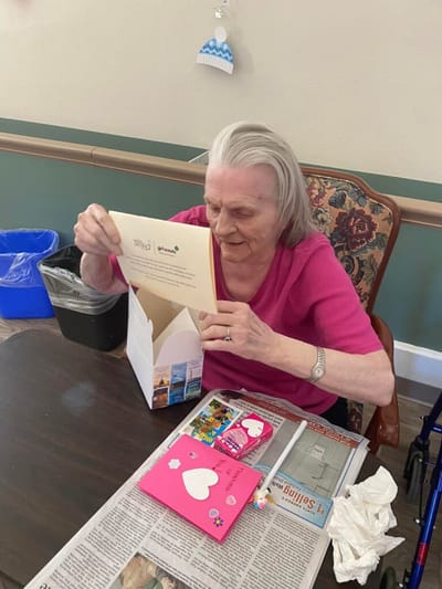 Resident engaging in an activity at a table