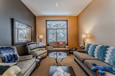 Cozy lounge area with comfortable seating and decor