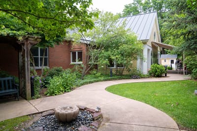 Pathway leading through a landscaped outdoor space