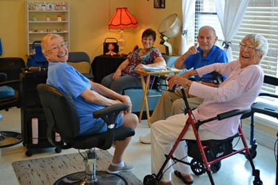Residents enjoying a hair salon activity