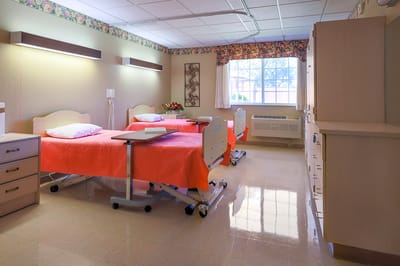 Interior view of a shared resident room with two beds